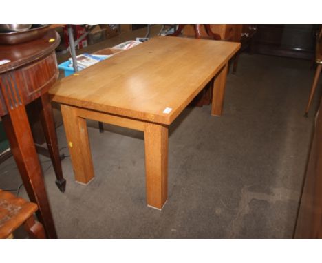 A light oak veneer coffee table 