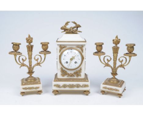 An attractive French white marble and gilt metal clock garniture
Early 20th Century the clock with a 10cm convex enamel dial 