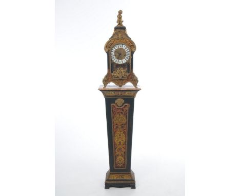 A 20th Century Louis XV style simulated boulle table clock on pedestal, 20th Century reproduction
The clock with a 20cm gilt 