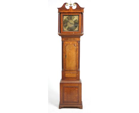 A 19th Century oak and inlaid longcase clock, signed John Hough
With a 30cm brass dial with Roman numerals, subsidiary date a