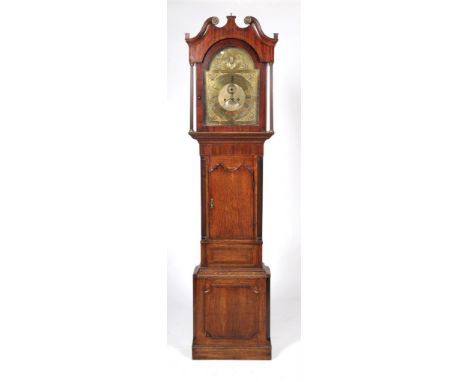 An early 19th Century oak and mahogany longcase clock signed Baker Appleby
With a 35cm brass arched dial with subsidiary seco