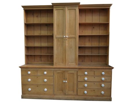 A good Victorian pine breakfront housekeepers cupboard
With a cavetto and ovolo cornice above a pair of panelled cupboard doo