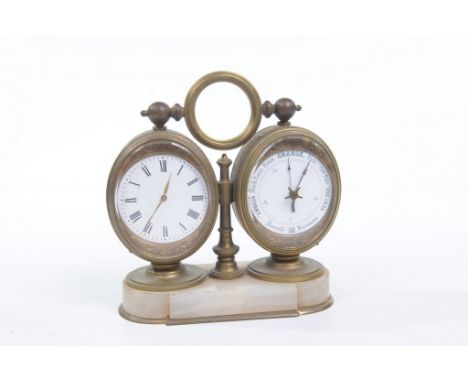 A French gilt brass combination desk timepiece with aneroid barometer and thermometer, circa 1880.  The timepiece with a 5.5c