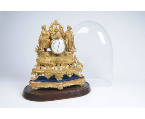 A 19th Century French gilt spelter figural mantel timepiece
With a 9cm white dial with Arabic numerals the  single train move