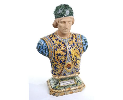 A  Continental majolica portrait bust of Philip, of Spain
Head and shoulders, raised upon a downswept shaped rectangular plin