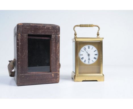 A French gilt brass striking carriage clock.  With a 5.5cm white enamel dial, signed Goldsmiths & Silversmiths, 12 Regent Str