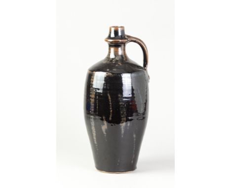 DAVID LEACH (1911-2005) for Lowerdown Pottery; a stoneware flagon covered in tenmoku breaking to kaki glaze, impressed DL mar