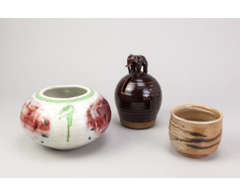 MICKI SCHLOESSINGK (born 1949); a salt glazed tea bowl, impressed M mark, height 8cm, a Peter Fishley Holland money box with 