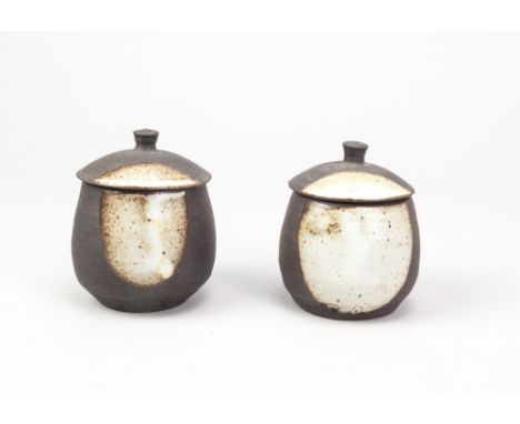 JANET LEACH (1918-1997) for Leach Pottery; a pair of small stoneware jars and covers, impressed JL and pottery marks, height 