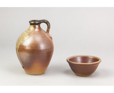 JOHN LEACH (1939-2021) for Muchelney Pottery; a stoneware flagon with running green ash glaze to one side, impressed JHL and 