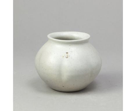 BERNARD LEACH (1887-1979) for Leach Pottery; a lobed porcelain pot covered in celadon glaze, impressed BL and pottery marks, 