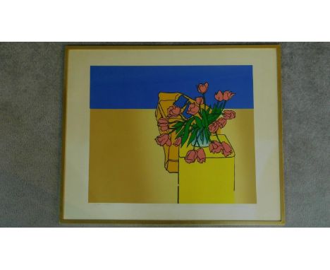 A framed and glazed lithograph depicting flowers in a vase. 65x80cm 