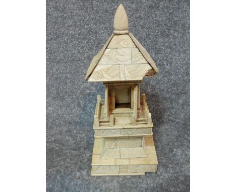 An antique carved Japanese ivory Okimono Dragon temple statue and vintage light in the form of a Victorian lamp post with bra