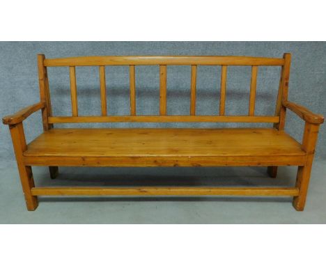 An American yellow wood bench. H.97 W.190 D.55cm 