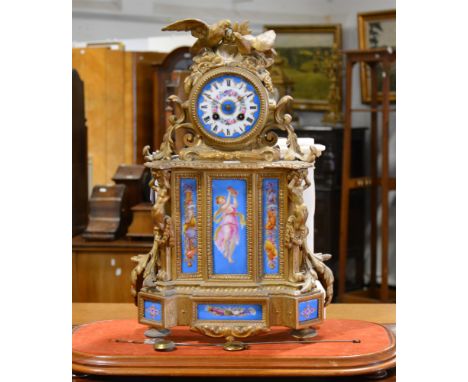 Large French gilt spelter mantel clock, the case inset with blue ground porcelain panels, circular dial (damaged), cylinder m