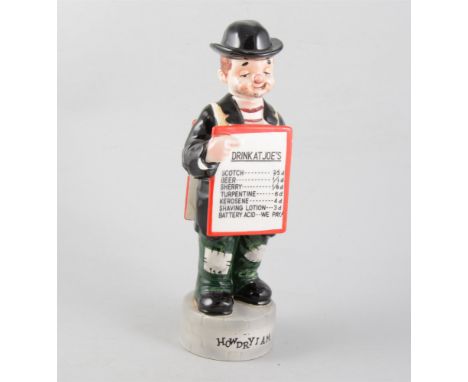 Continental pottery novelty flask, 'How Dry I Am', musical movement to the base, 34cm, chipped.