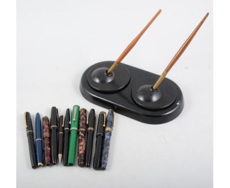 Collection of pens and playing cards.