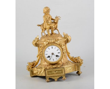 19th Century French gilt spelter mantel clock, the case designed with a boy and a goat, circular enamelled dial, French cylin