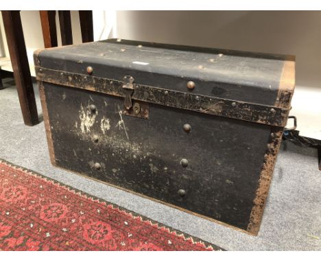 Vintage trunk, canvas bound with metal straps, labelled Whiteridges, 69x43cm, height 40cm, (a.f.).