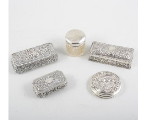 Three rectangular silver trinket boxes, repousse chased with vacant cartouches, 2 x 10.5cm, 1 x 7.5cm, Birmingham 1902, Londo