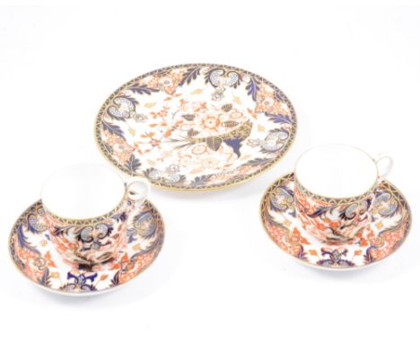 Two Royal Crown Derby Imari ware teacups and saucers, and a side plate, 20.5cm diam (5)