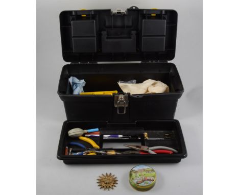 Small toolbox of amateur clock repairers tools and various clock keys.