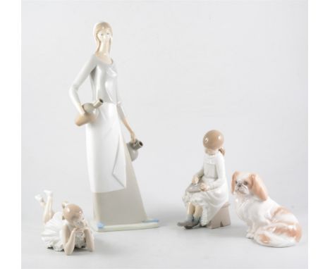 Royal Copenhagen model of a Spaniel, No. 1772, 12cm; other Copenhagen models, a Danish porcelain dish, a Nao figure, another 