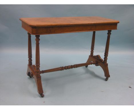 A mid-Victorian light oak side table, rectangular, pollarded top on fluted and tapering end-supports, similar stretcher, on c