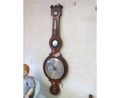 An early 19th century rosewood wheel barometer, level dial signed Wm. Rombach, Herne Hill, further silvered barometer, thermo