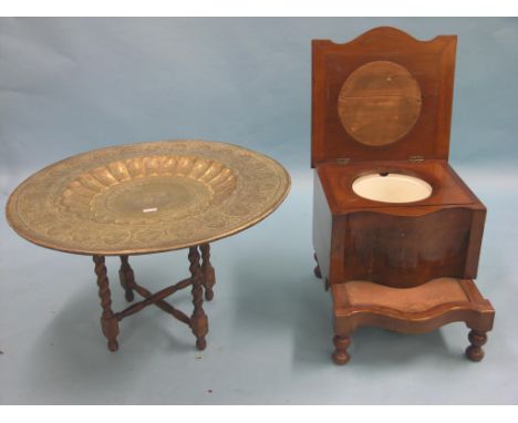 A Victorian serpentine-fronted mahogany commode, with sliding foot-rest and inset gilt-tooled leather, together with an engra