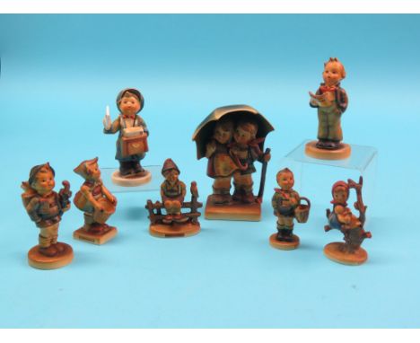 Eight various Hummel figures, one head re-attached, a china part teaset, canteen of plated cutlery, etc. 