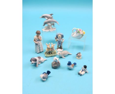 Seven various Royal Copenhagen ornamental models, and five other ornamental ceramic models