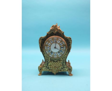 A 19th century green boullework mantel clock, with elaborate ormolu mounts in rococo-style, 5.5in. dial with enamelled numera