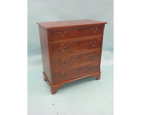 A reproduction yew-veneered chest, cross-banded top above four long drawers, bracket feet, 2ft. 9in.