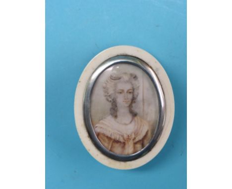 An early Victorian oval ivory box, cover inset with a female portrait miniature, 3.5in.  Shipping arrangements limited.  Buye