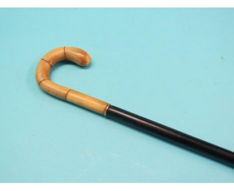 An horn-handled ebony walking stick 40in.