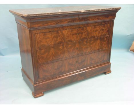 A 19th century French mahogany commode, Louis Philippe-period, grey-veined marble top above ovolo frieze drawer, four further