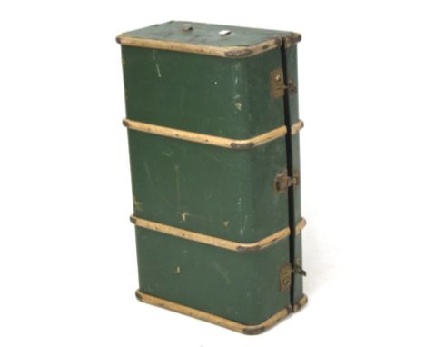 A vintage travelling trunk. Covered in green fabric with wooden bindings and latch locks, L92cm