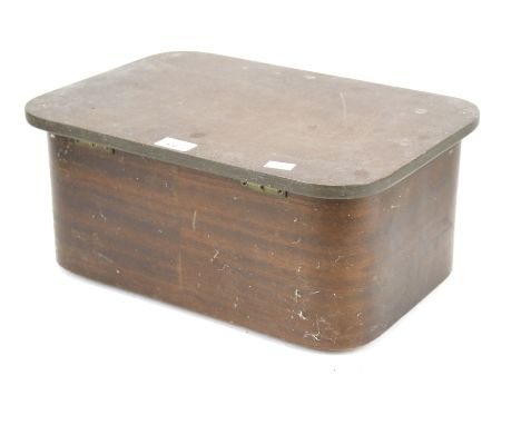 A Victorian mahogany sewing box. Of rectangular form with curved edges, the hinged top opening to reveal a green interior and