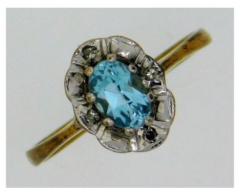 A 9ct gold topaz ring with four illusion set diamonds, 1.5g, size K 