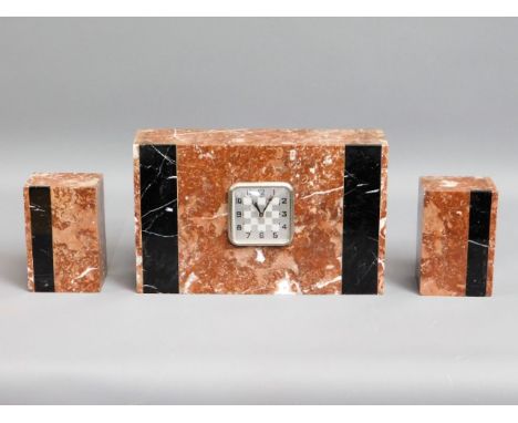 An art deco marble clock with garnitures, main clock 11.625in wide x 7.125in high x 3.25in deep
