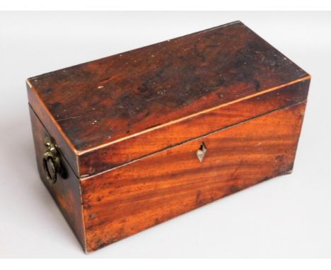 A Georgian mahogany tea caddy, brass handles &amp; covers in situ, feet damaged a/f, 12in wide x 6.25in high x 6in deep