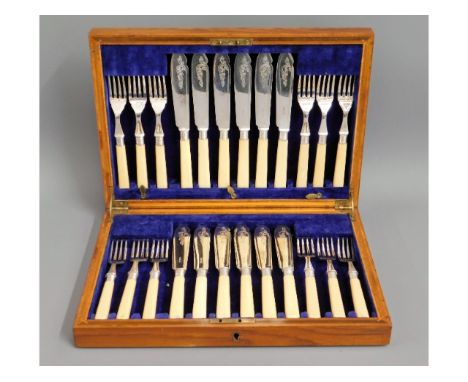 An oak James Dixon &amp; Sons 24 piece silver plated fish knife &amp; fork set