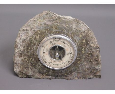 A serpentine mounted barometer 