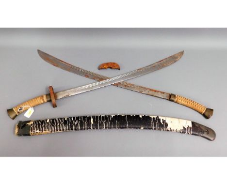 A Tibetan double sword &amp; scabbard a/f, 39in long 