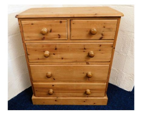 A pine chest with five drawers, 35.5in high x 30.25in wide x 16in deep 