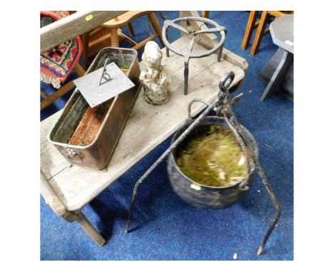 An iron cauldron &amp; stand, 32in high, twinned with a wrought iron stand, a copper planter &amp; sundial