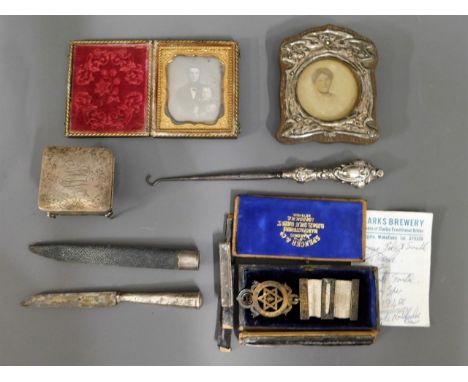 A Victorian daguerreotype, a silver mounted photo, silver a/f, a silver trinket box, lacking leg, a 1903 silver Spencer &amp;