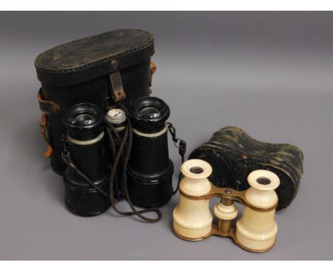 A pair of cased ivory opera specs twinned with a pair of small binoculars with compass 