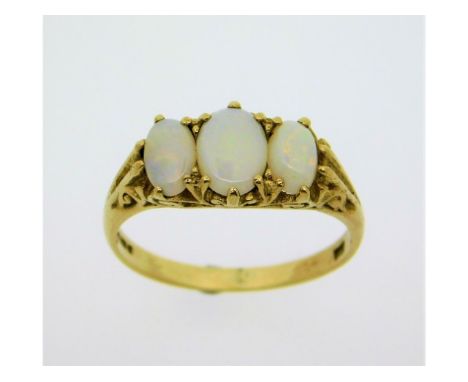 A 9ct gold ring set with opal within a decorative mount, 2.4g, size N